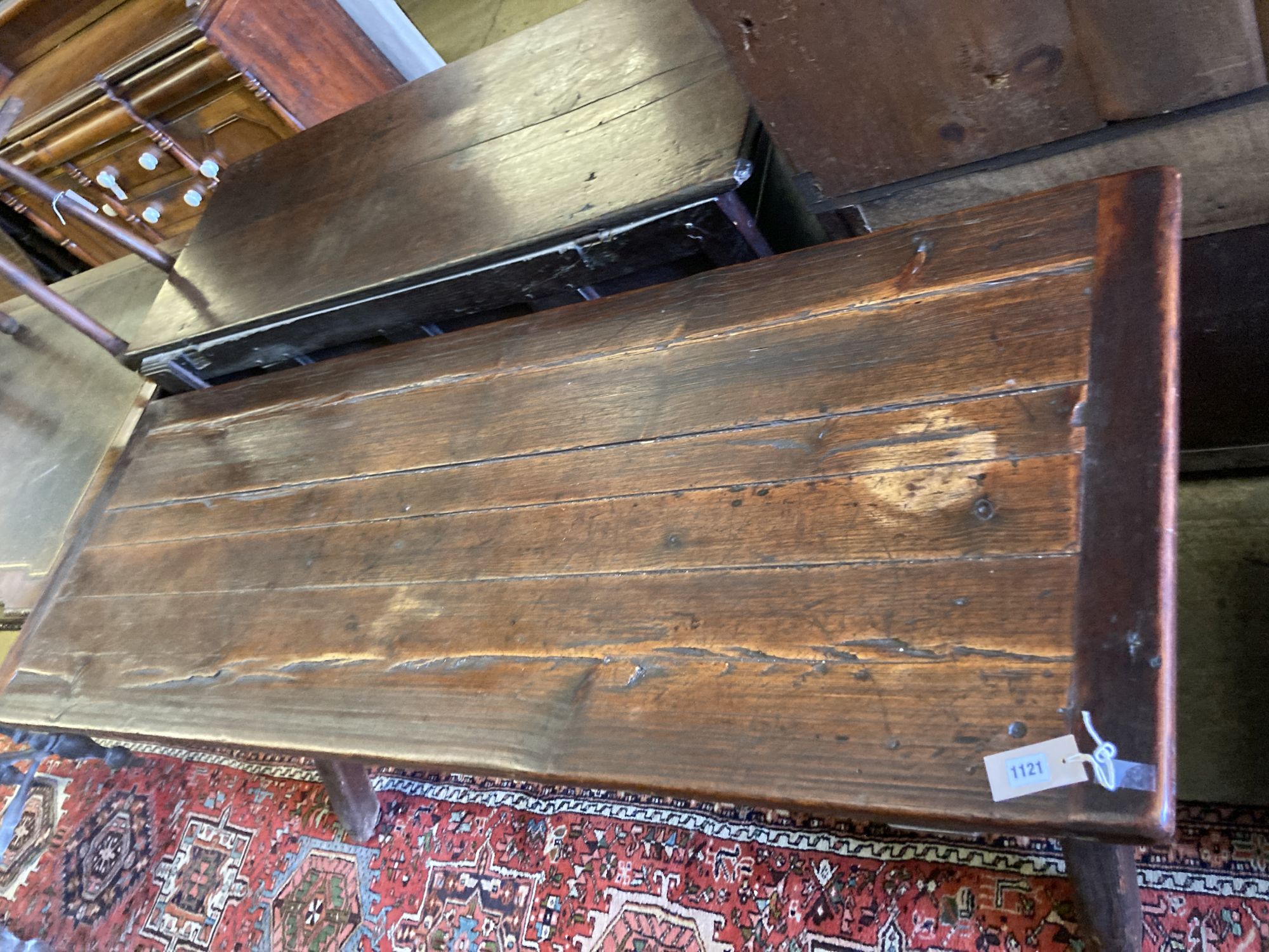 A 19th century pine refectory table, on trestle end supports, width 188cm, depth 68cm, height 77cm